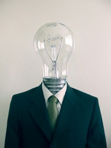 brainy light bulb in a suit