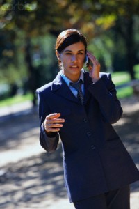 Businesswoman Using Cellular Phone Outdoors