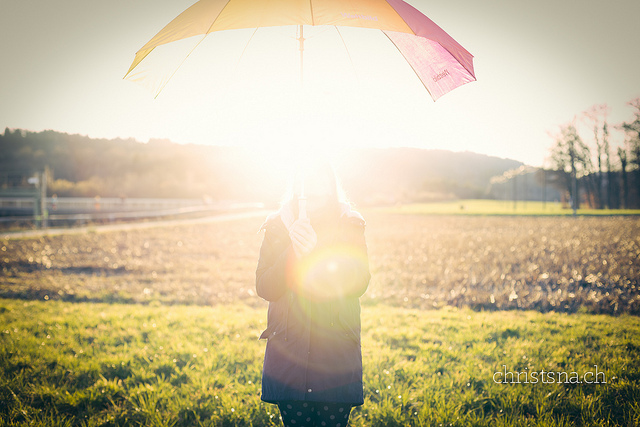 sunbathe sun rays UV protection umbrella