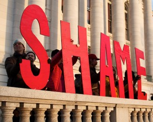 shame sign letters protest