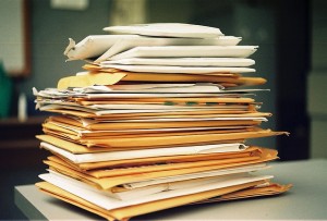 stack of files and envelopes