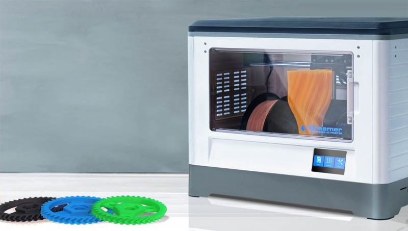 The Flashforge Dreamer 3D printer with some colorful cogs, via Flashforge