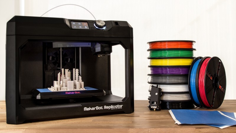 The MakerBot Replicator with spools of PLA filaments in a myriad of colors, via MakerBot Industries, LLC