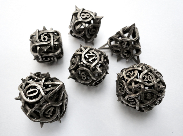 Shapeways, 3D printed item marketplace, has metallic dice made of twisted thorns.