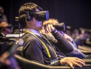 Reporters viewed VR experiences at Intel's press conference.